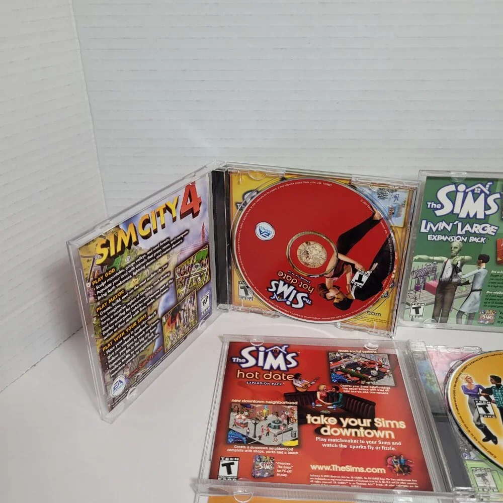 The Sims Lot of 4 PC Cd Hot Date, Vacation, Livin Large, Games